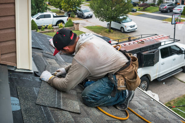 Professional Gutter Repair And Installation technician working in Melville, RI